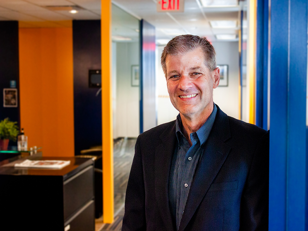 headshot of Marc Postlethwaite standing in the Concord office